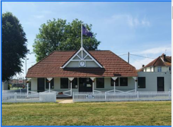 Hailsham pavilion cricket club with white picket fence