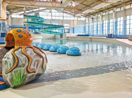 Sovereign Centre fun pool with a blue swirling slide and a octopus baby slide