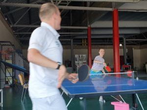 People playing table tennis