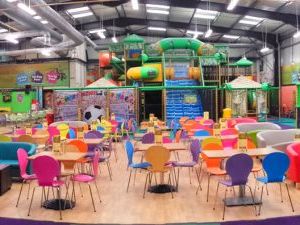 Inside monkey bizness, it shows the seating area and an overview of the soft play