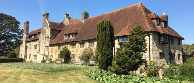 Image of Michelham Priory house, picture is taken outside and shows a house from a sidewards.