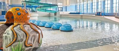 Sovereign Centre fun pool with a blue swirling slide and a octopus baby slide