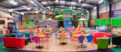 Inside monkey bizness, it shows the seating area and an overview of the soft play